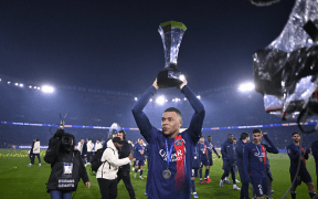 Kylian Mbappe: Emoții și Succes după Câștigarea Trofeului Campionilor!