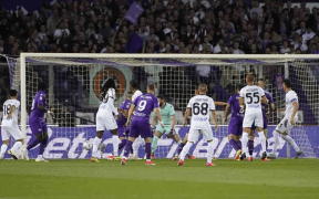 Fiorentina și Napoli Remizează Într-un Meci Spectaculos cu Patru Goluri