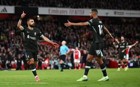 Liverpool și Arsenal Remizează într-un Meci de Foc: Mohamed Salah Aduce Egalarea pe Final